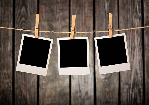 istock Blank photos hanging on clothesline. 160913513