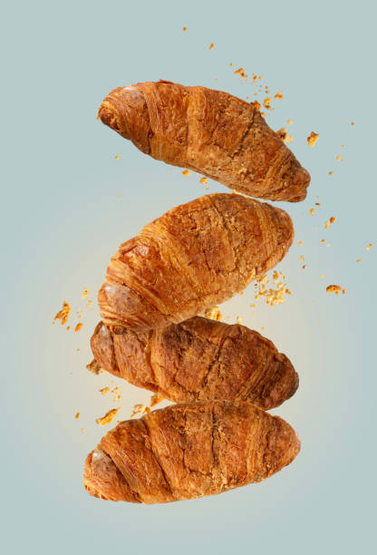 istock puff pastry pies with crumbs flying on a blue background 1609146372