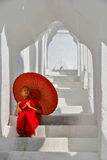 istock A Buddhist novice monk at white temple 1609152217