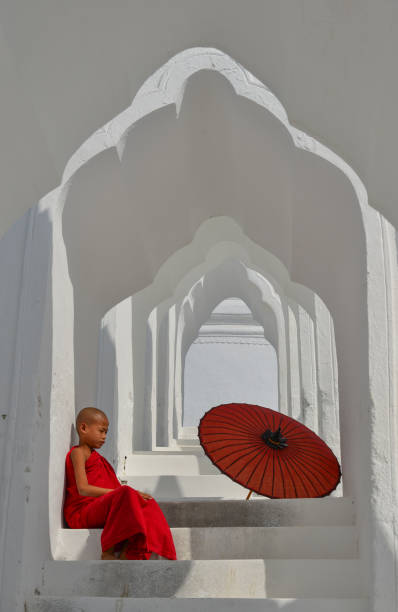 istock A Buddhist novice monk at white temple 1609152726