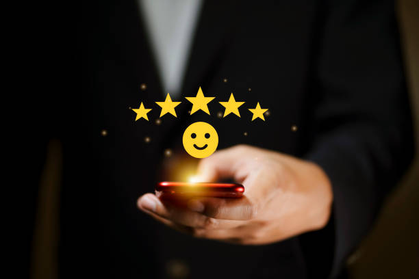 istock businessman using smartphone and pushing smile button for the best evaluation , customer satisfaction concept. 1609201227