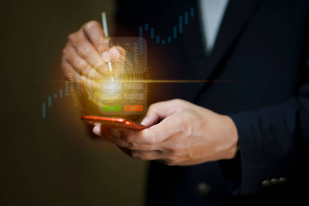 istock business finance and investment with a captivating data analysis concept, businessman using laptop and tablet to analyze market data, plan strategies, and conduct market research. 1609202263
