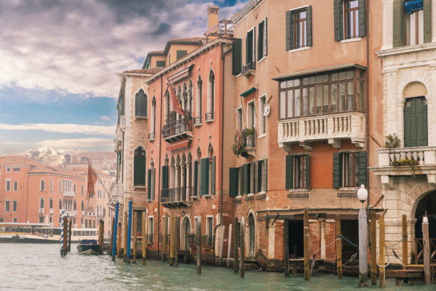 Beautiful old buildings along the waterfront. Travel and tourism in Venice, Italy, Europe.