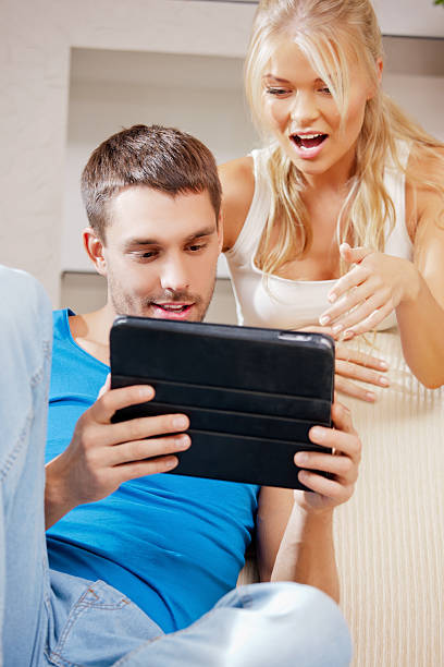 istock happy couple at home 160921556