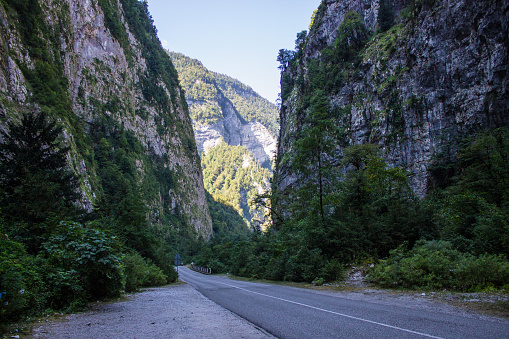 Yupshar canyon - a stone bag with steep stone cliffs in Abkhazia and a space for copying