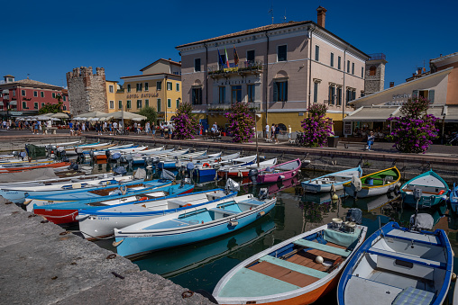 Small harbor in the village of Bardolino on the eastern shore of lake Garda, Italy.
