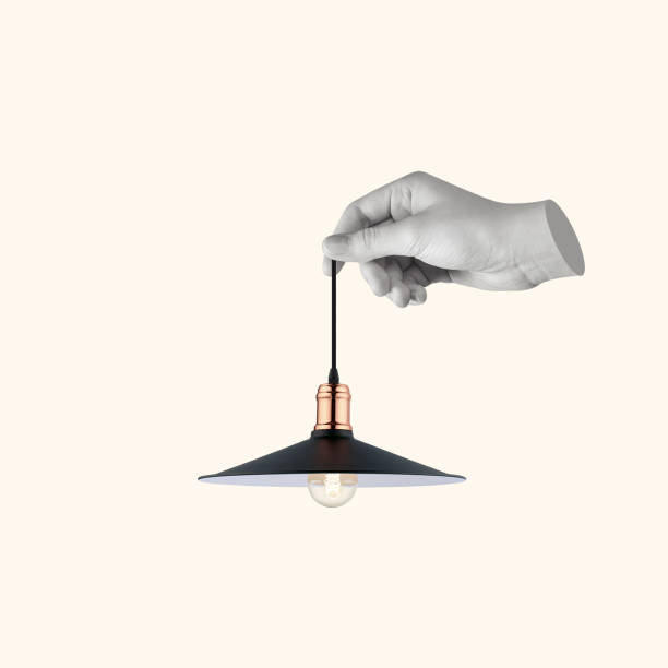 istock Modern art collage of a hand holding a light bulb. 1609291927