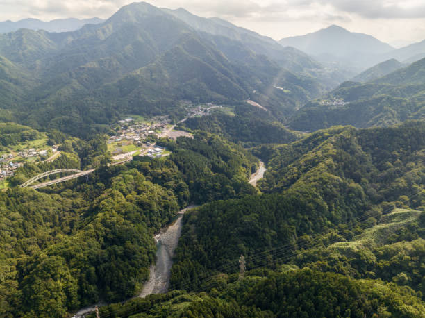 istock A rural village surrounded by mountains and rivers 1609311426