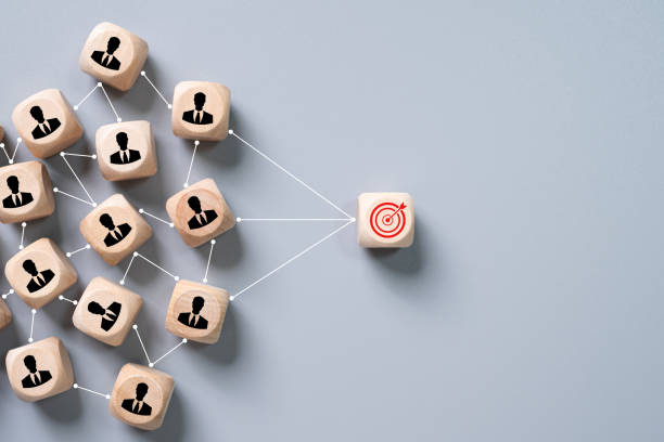 istock Red dartboard sign as a target connected with many business person or working staff. Target customer or Human resource, head hunter concept. 1609313626