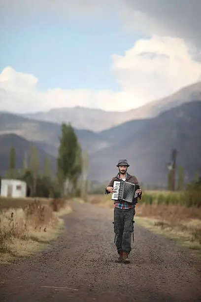 Photo of Man playing accordion