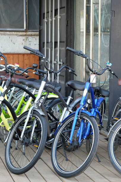 istock several colorful bicycles stand in a row 1609372124
