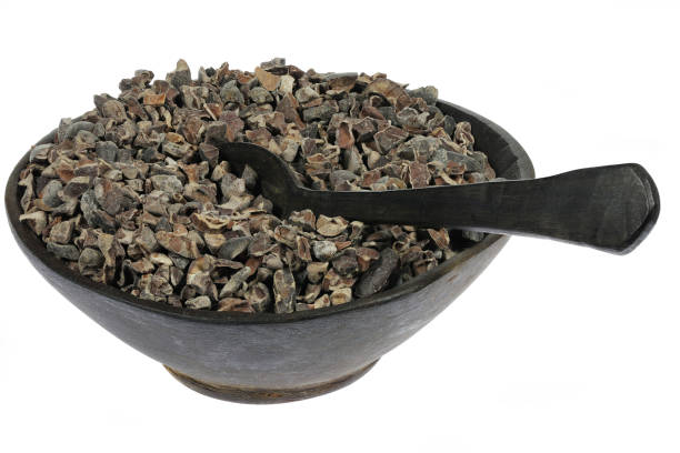 istock cocoa nibs in a wooden bowl with spoon 1609384891