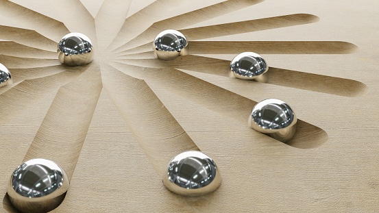 Chrome plated iron balls roll on a Japanese-style wooden pattern. An image of a logic board game for meditation. 3d render.