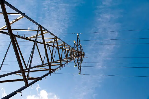 Photo of A image of asian electrical power grid and blue sky.