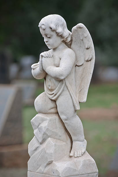 istock Stone Statue of a Cherub Angel 160941916