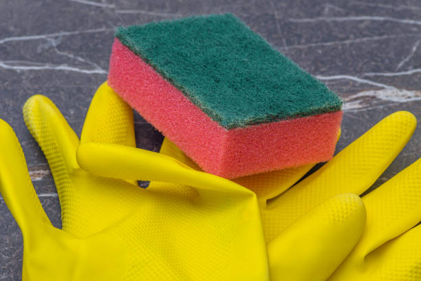 istock household gloves with cleaning sponge 1609437751