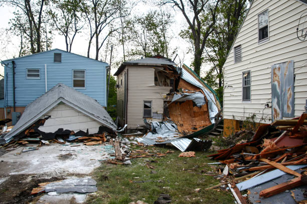 istock Group of Houses Damaged by Storm 1609438751
