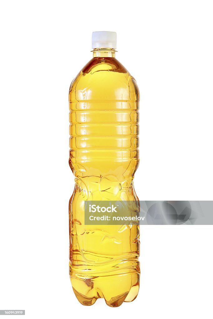 Botella de plástico con una bebida. - Foto de stock de Alimento libre de derechos