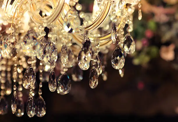 .Chrystal chandelier close-up. Glamour background with copy space