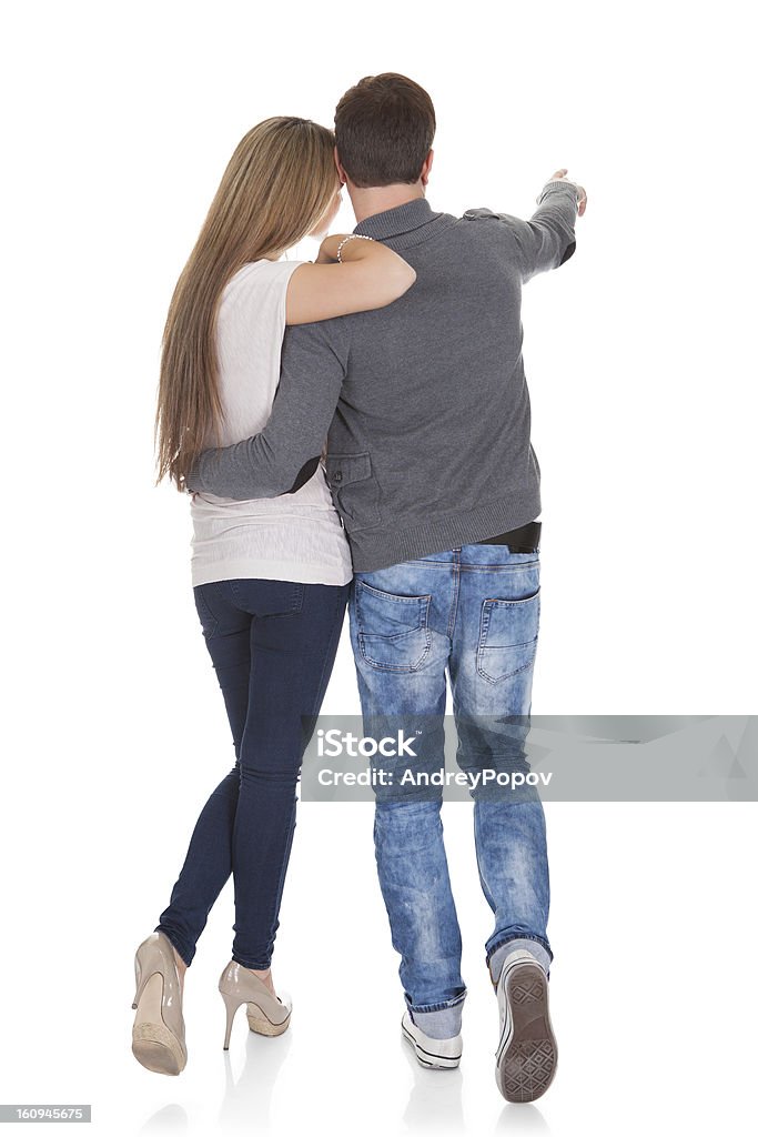 Sweet partners hold hands Sweet partners hold each others' hands while walking. Back to Front Stock Photo