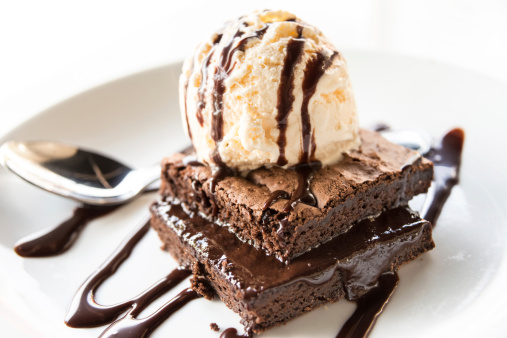 Brownie with vanilla ice cream close up