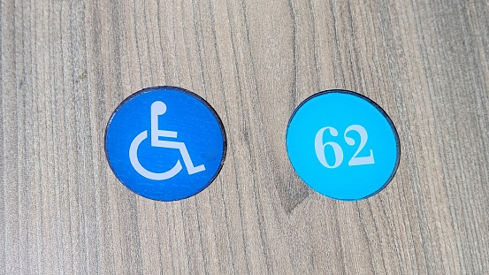 Disabled-enabled bus stop sign