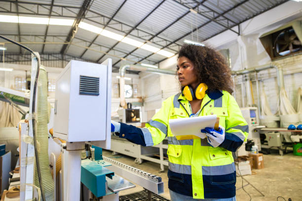 istock staff woman worker work operate cutting machine. Lathe CNC engineer. modern factory working woman. smart women worker industry workplace 1609465603