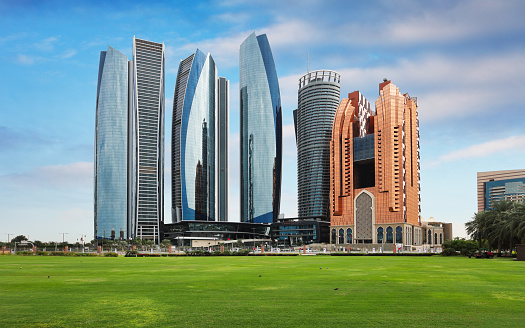 Skyscraper towers and cityscape skyline of Abu Dhabi, UAE at day