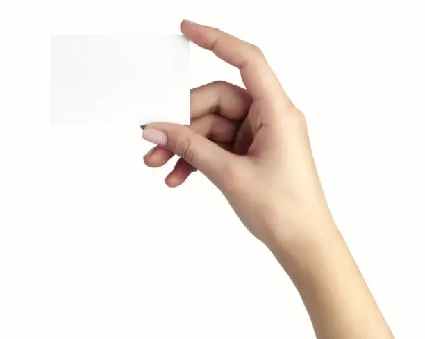 female hand holding a businesscard