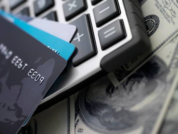 istock Credit cards and calculator on dollars 160948681