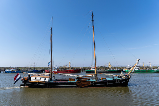 HARLINGEN, NETHERLANDS - MAY 13, 2023: two-mast clipper Aldebaran in the port of Harlingen