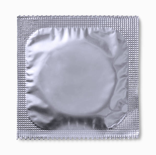 コンドーム白背景 - condom contraceptive sensuality healthcare and medicine ストッ��クフォトと画像