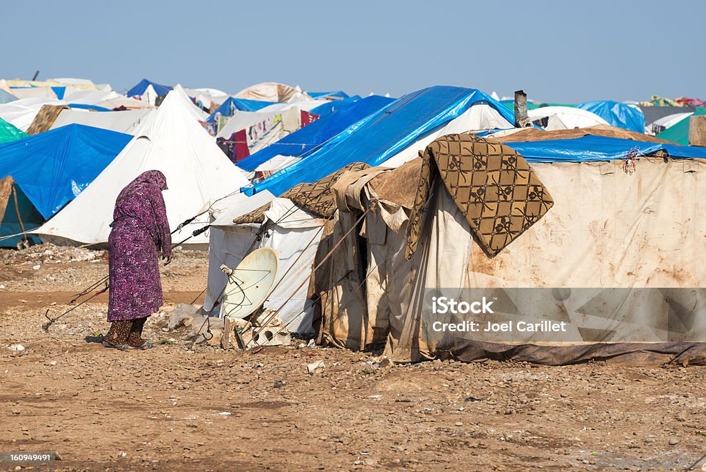Syrian refugee crisis Syrian woman in the camp for displaced persons in Atmeh, Syria (January 2013) Refugee Stock Photo