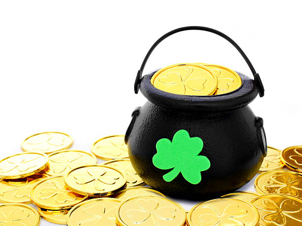 istock St Patrick's Day Pot of Gold with coins over white 160950816