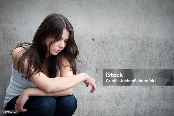 Teenage Girl Looking Thoughtful About Troubles Stock Photo - Download Image Now - Teenage Girls, Emotional Stress, Sadness