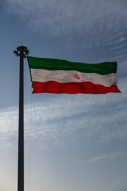 istock The Iranian flag fluttering in the wind 1609530547