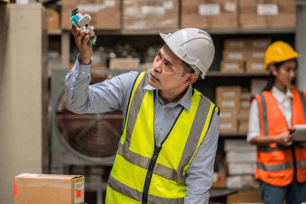 istock senior mananger products inspector quality control checking examination hardware electornics part before shipping or receiving in inventory store collection 1609534080