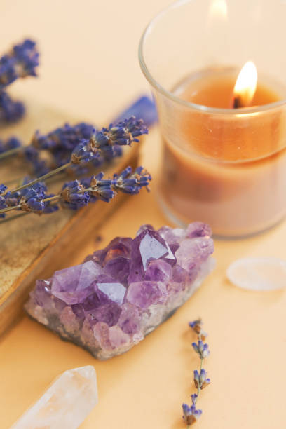 istock Amethyst, candle and lavender still life 1609536392