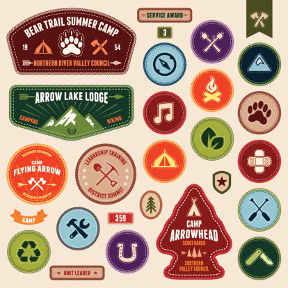 Set of scout badges and merit badges for outdoor activities.