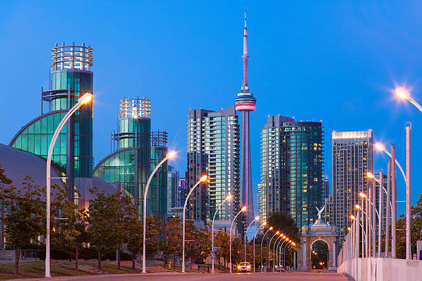 Toronto, Canada Exhibition Place with the Prince's Gate and the CN Tower in the background, Toronto, Canada. exhibition place toronto stock pictures, royalty-free photos & images