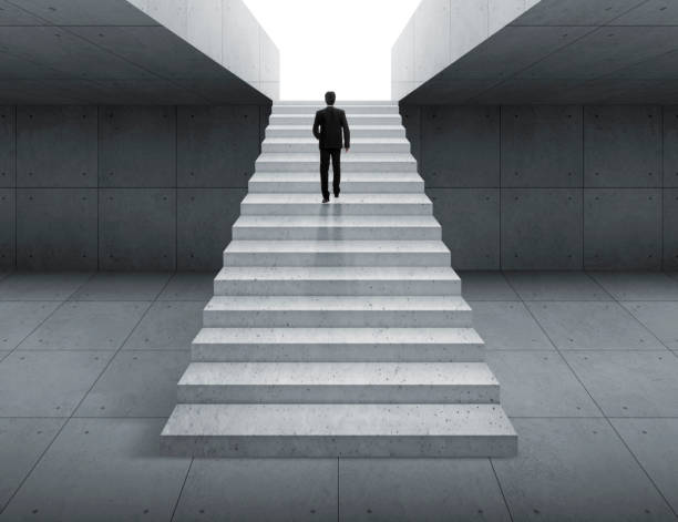 istock Ambitious concept with businessman climbing stairs 1609564649