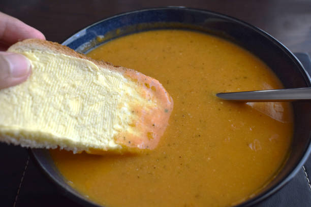 istock Vegetable soup with bread in a bowl. 1609572030