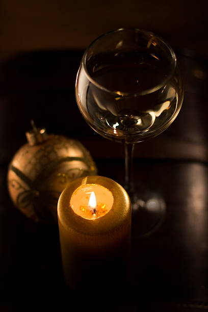 istock Christmas decorating glass with champagne and burning candles 160959186