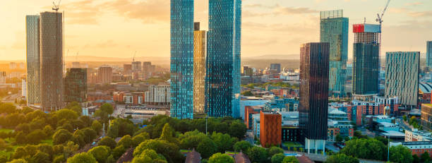 istock Manchester Skyline at Golden Hour 1609599215