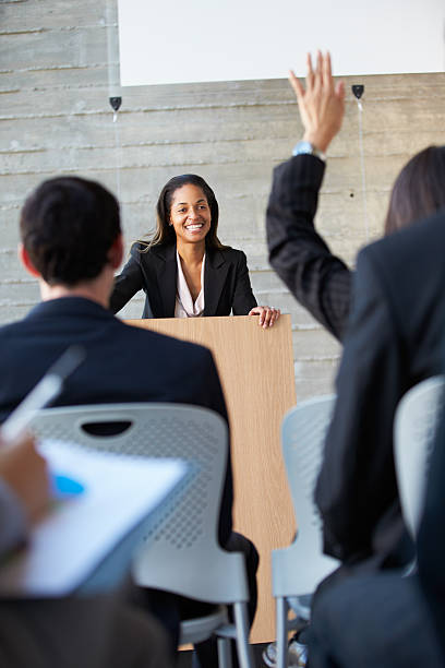 istock Businesswoman delivering a conference presentation 160960900