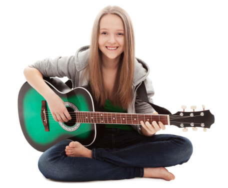 young beauty music girl with guitar on white background 