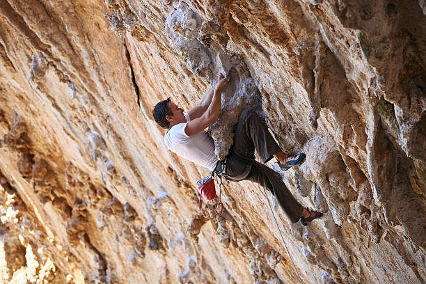 istock Rock climber on face of cliff 160966311
