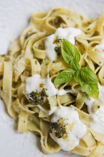 istock Homemade tagliatelle with pesto and stracciatella 1609666907
