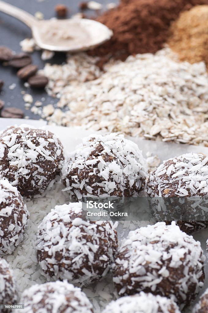 Candy Balls Raw food candy balls with grated coconut. Almond Butter Stock Photo