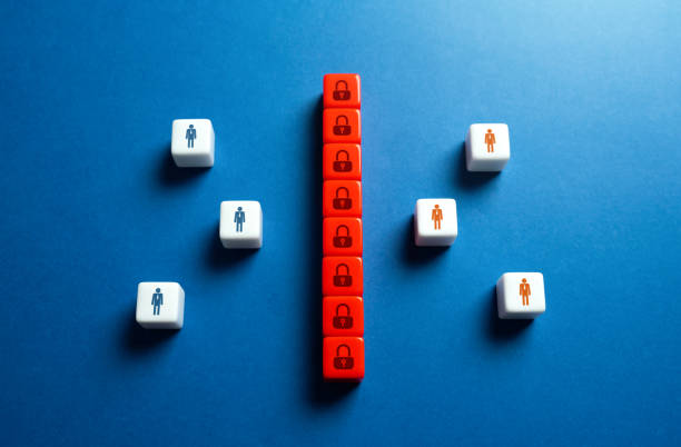 istock Businessmen are separated by a prohibitive barrier. 1609680987